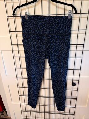 Athleta Salutation Stash Pocket Black and Cobalt Leopard tights